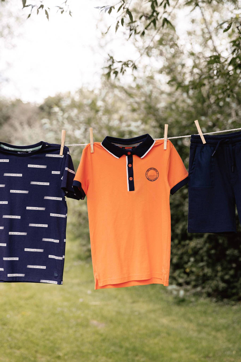 Quapi polo BIKO oranje/donkerblauw