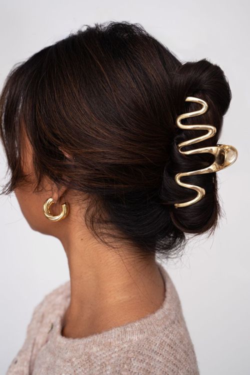 Goudkleurige haarclip met twist