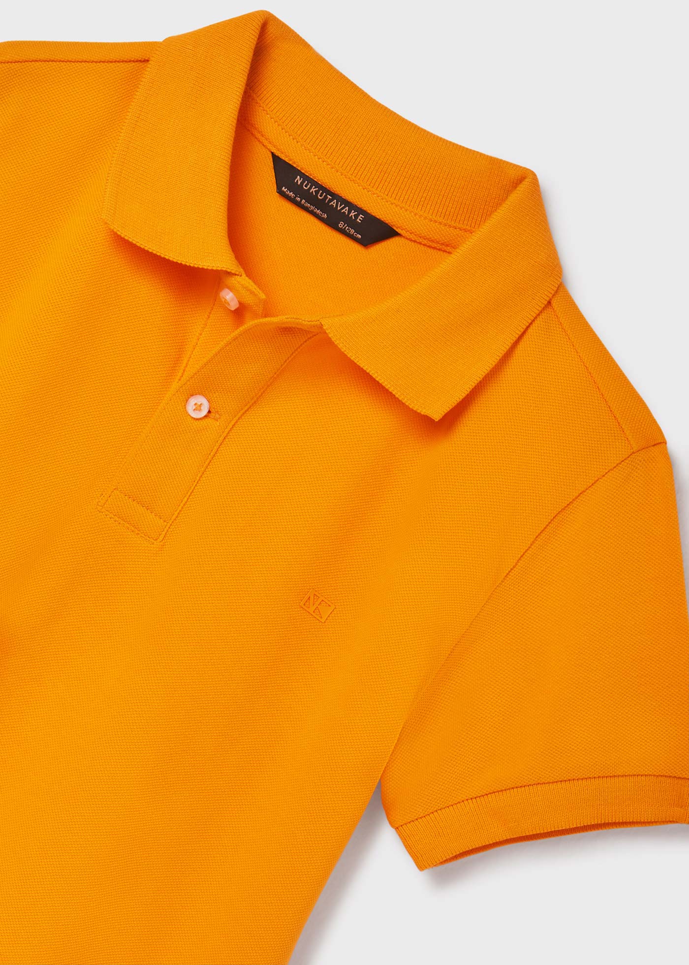 Camisa polo de manga curta em algodão sustentável para meninos