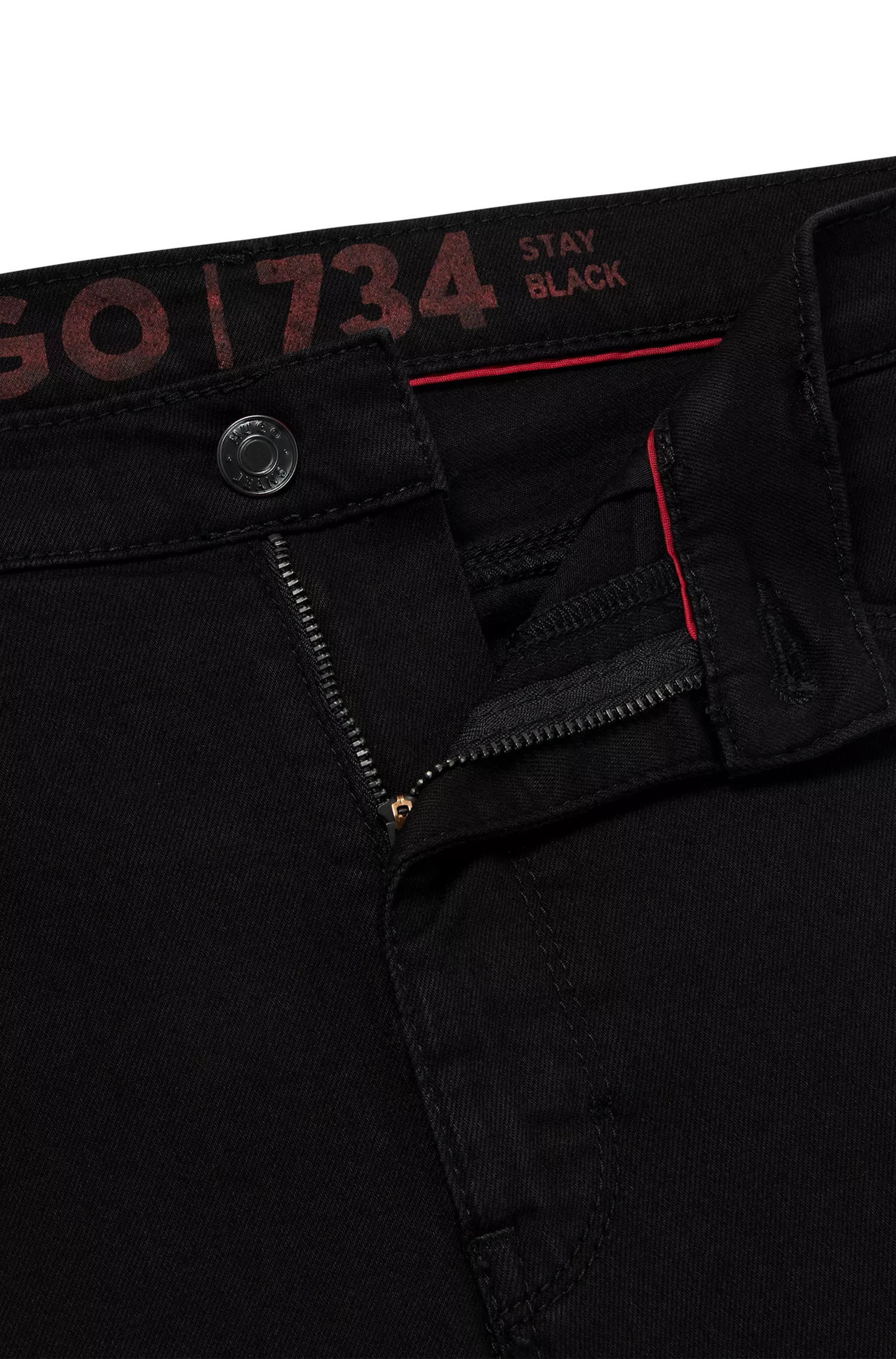Calça jeans HUGO vermelha, corte extra slim, em denim com elasticidade para maior conforto.