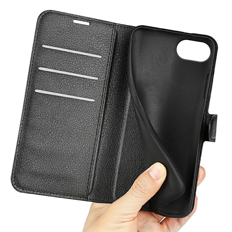 iPhone 16e Leder Tasche Flip Cover Litchi Look - Schwarz