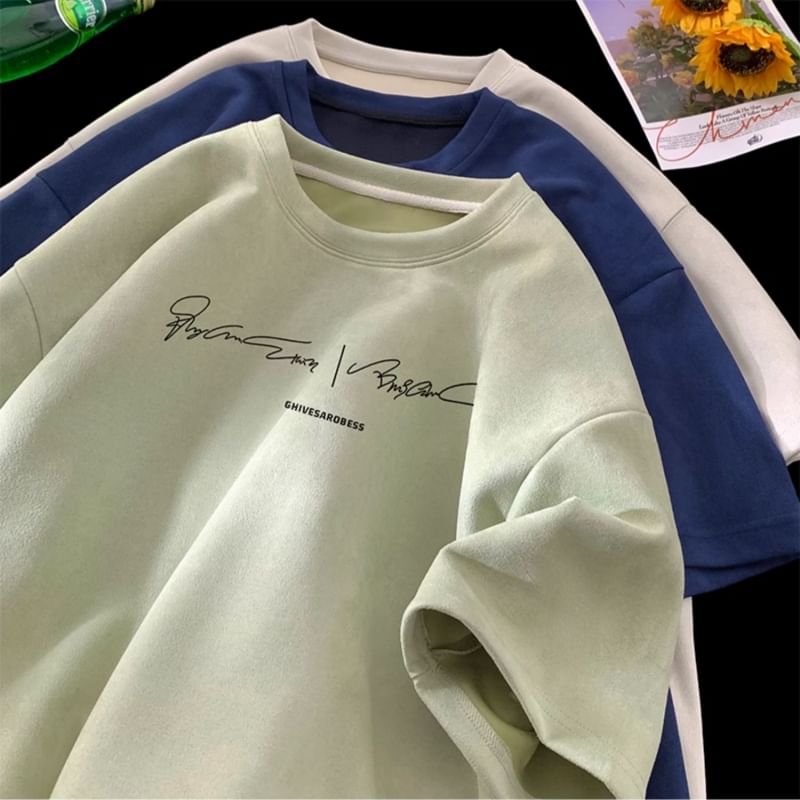 fluffush - T-shirt met korte mouwen, ronde hals en letterprint van imitatiesuède