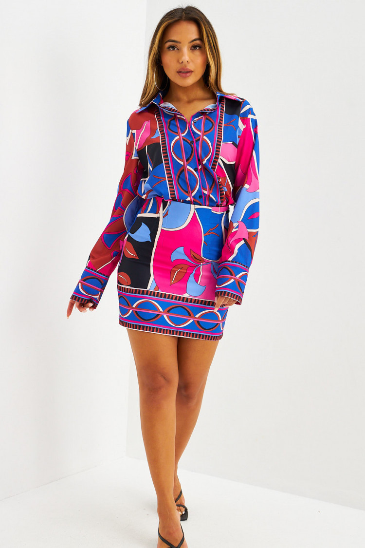 Ensemble chemise + jupe courte bleu/fuchsia à motif année 80