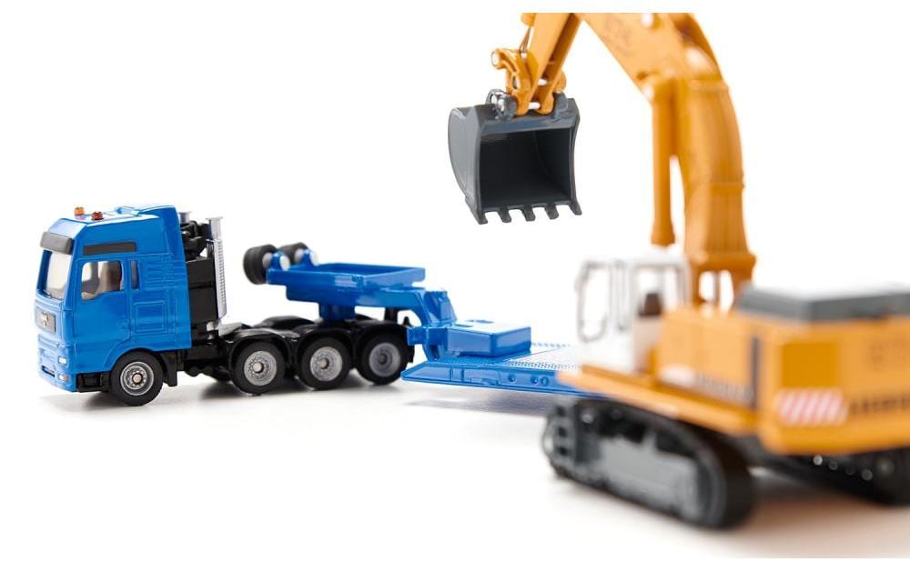 MAN TG-A Schwertransporter mit Liebherr Bagger 1:87H0 MAN Lastwagen mit Tiefbettauflieger und Liebherr Löffelbagger