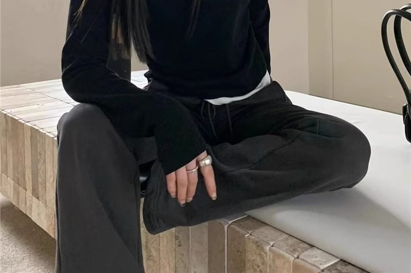 Rosesand - Tweedelige crop top met lange mouwen en kleurblokken