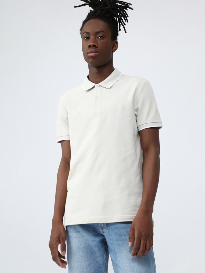 Camisa polo básica e vibrante - Areia clara