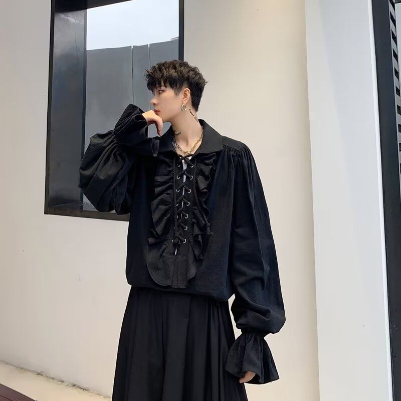 JUN.LEE - Pofmouw effen geplooid veterblouse