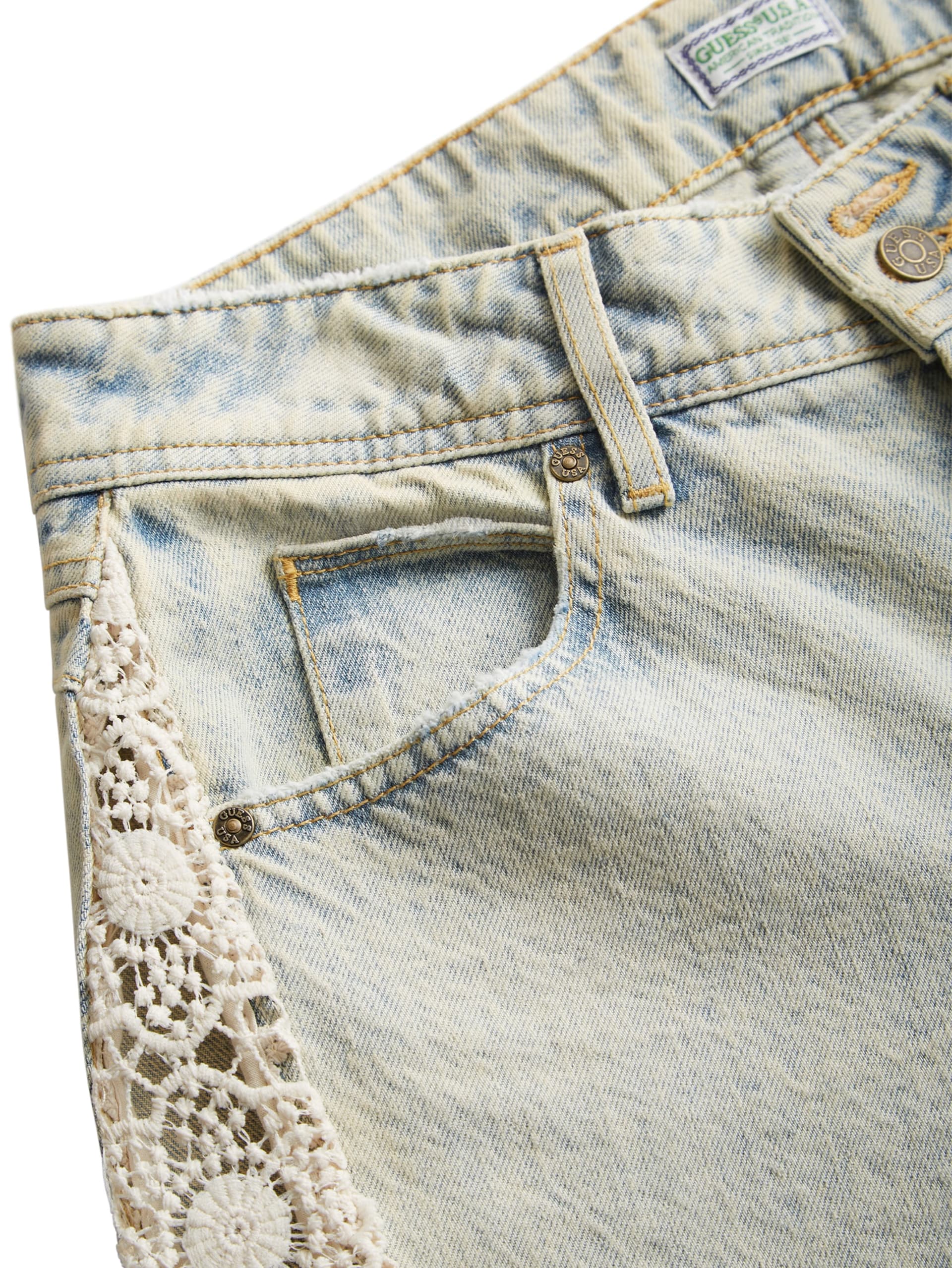 calças flare de jeans com renda