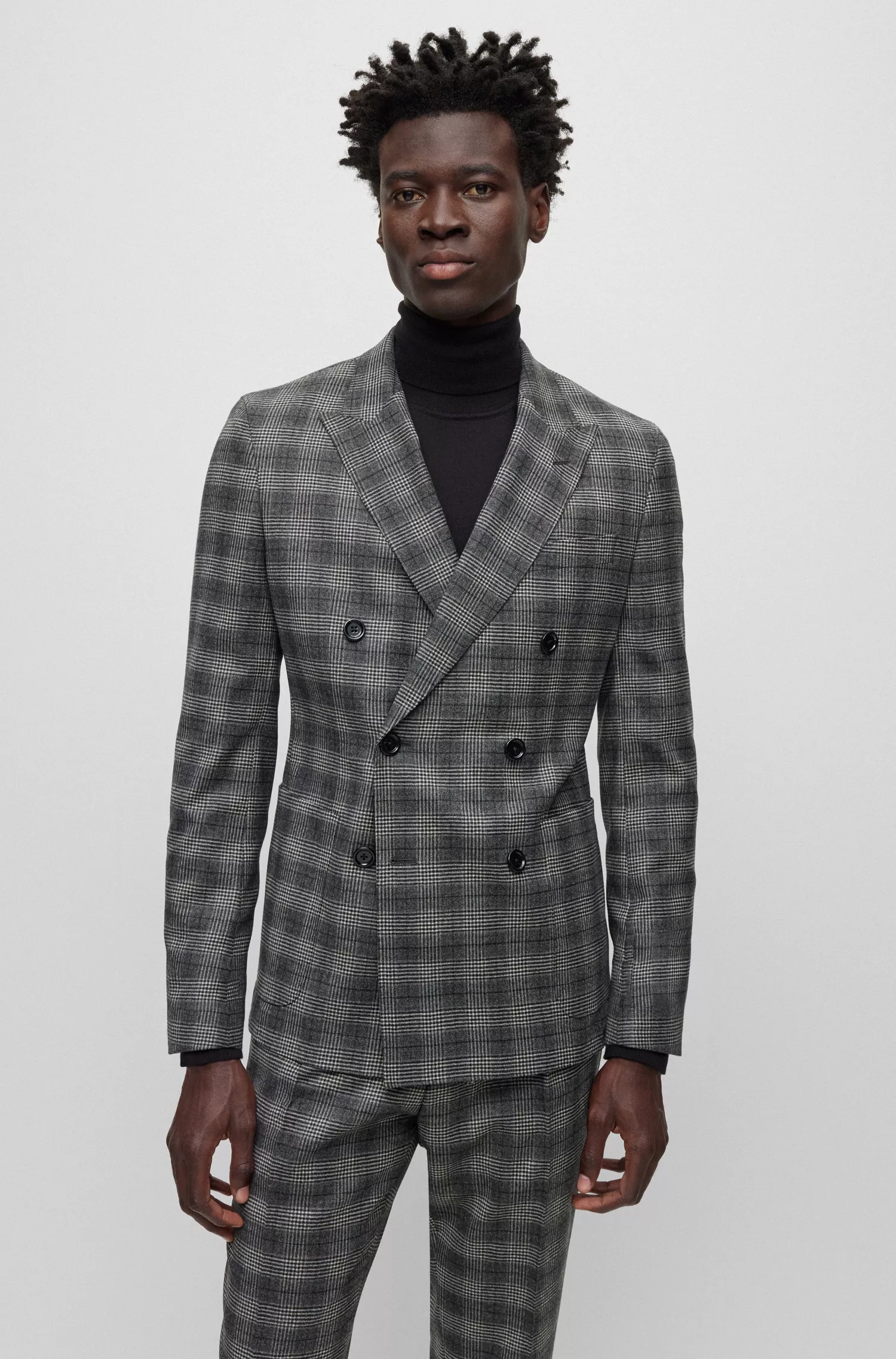 Terno BOSS preto slim fit em lã elástica xadrez.