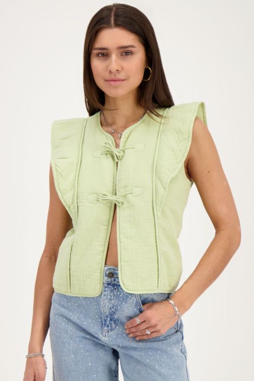 Groen gilet met strikjes en ruffles