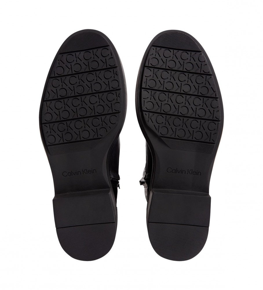 Botas de combate Calvin Klein com sola de borracha, em couro, pretas.