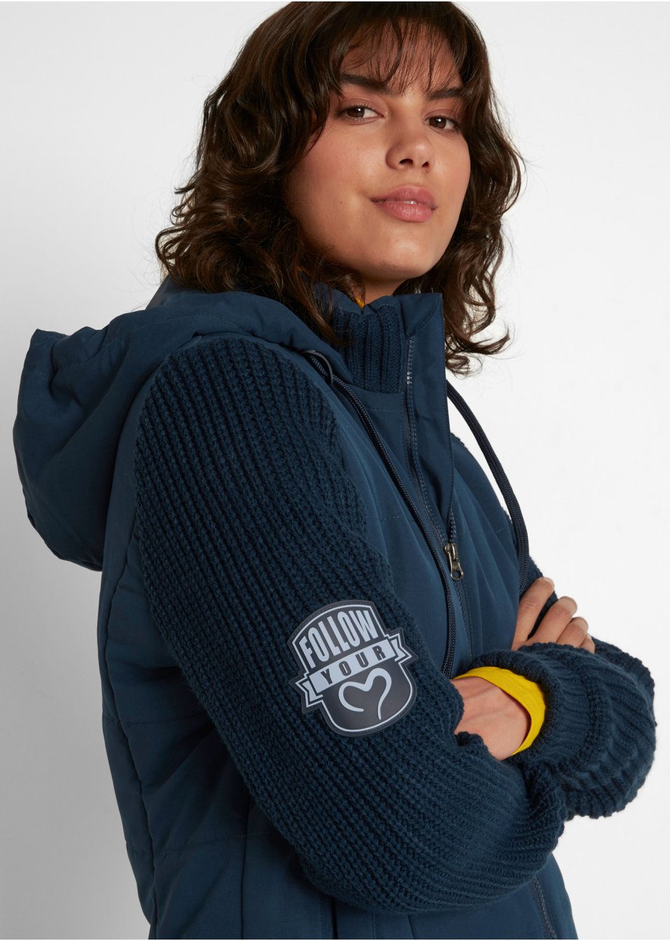 Veste mi-saison avec manches en maille et capuche