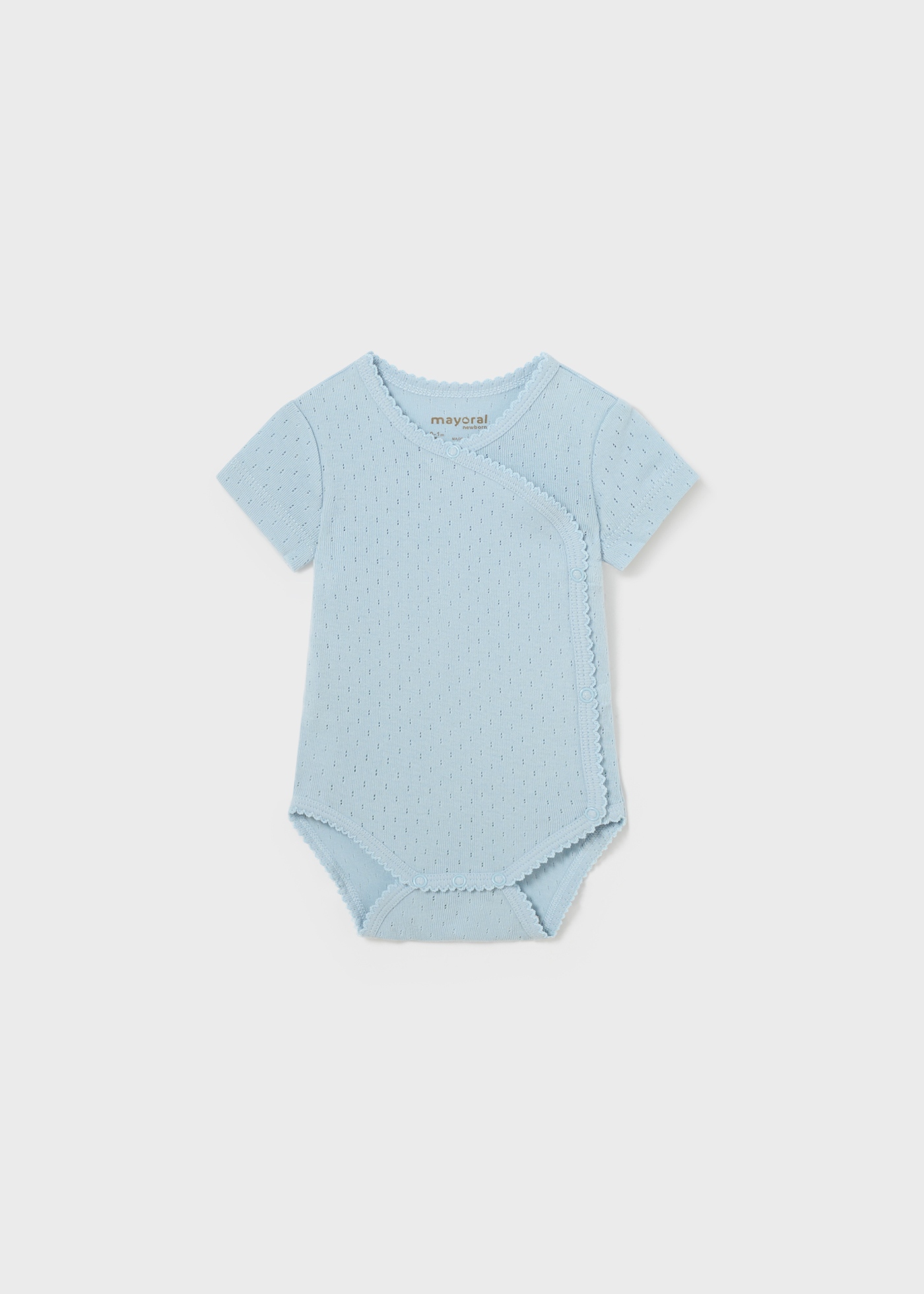 Body Better Cotton para recém-nascido, cor nude, com detalhes vazados.