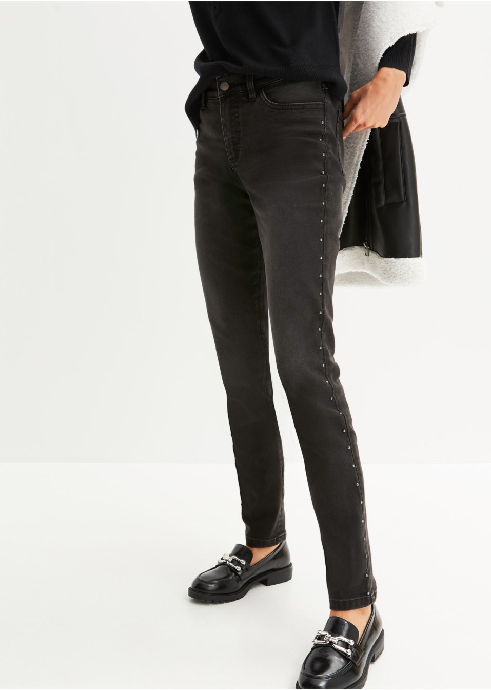 Jean extensible avec rivets