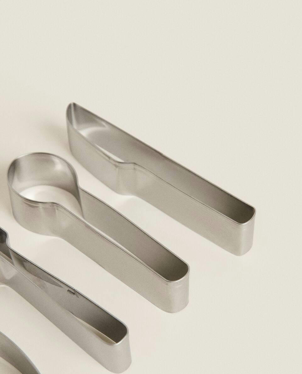 Conjunto de moldes de aço em formato de utensílios de mesa