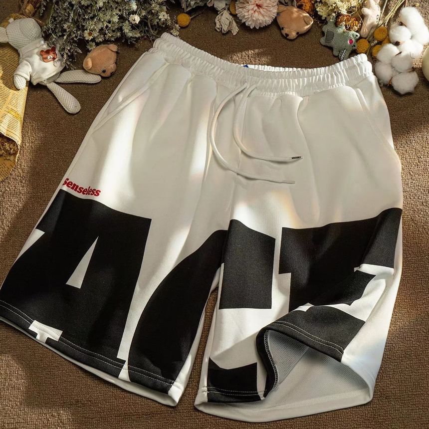 Acrius - Mid Rise Lettering Shorts