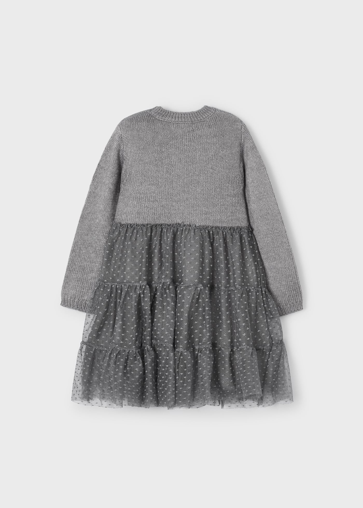 Vestido infantil combinando malha e tule.