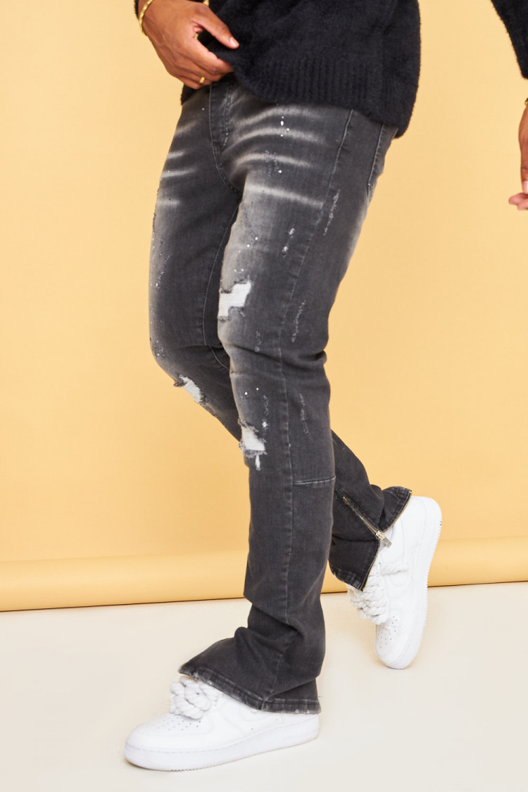 Jeans noir usé avec tâches et déchiré