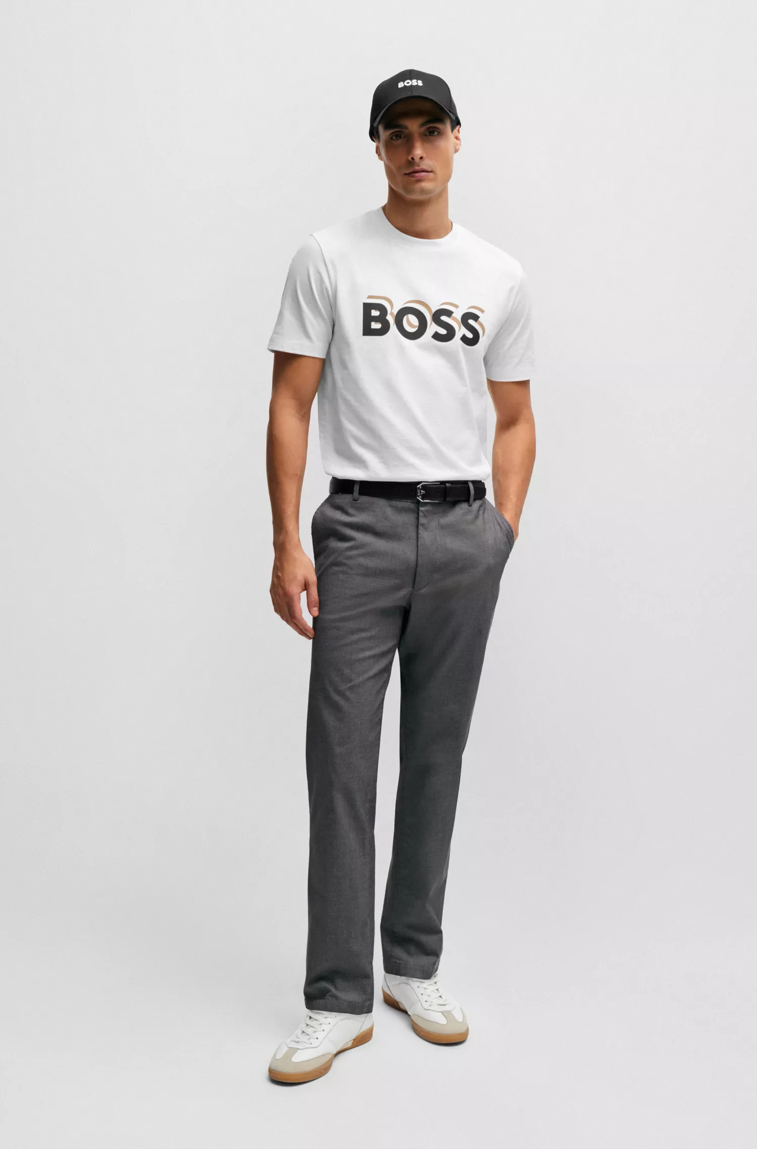 Calças BOSS pretas de corte regular em algodão elástico estampado.