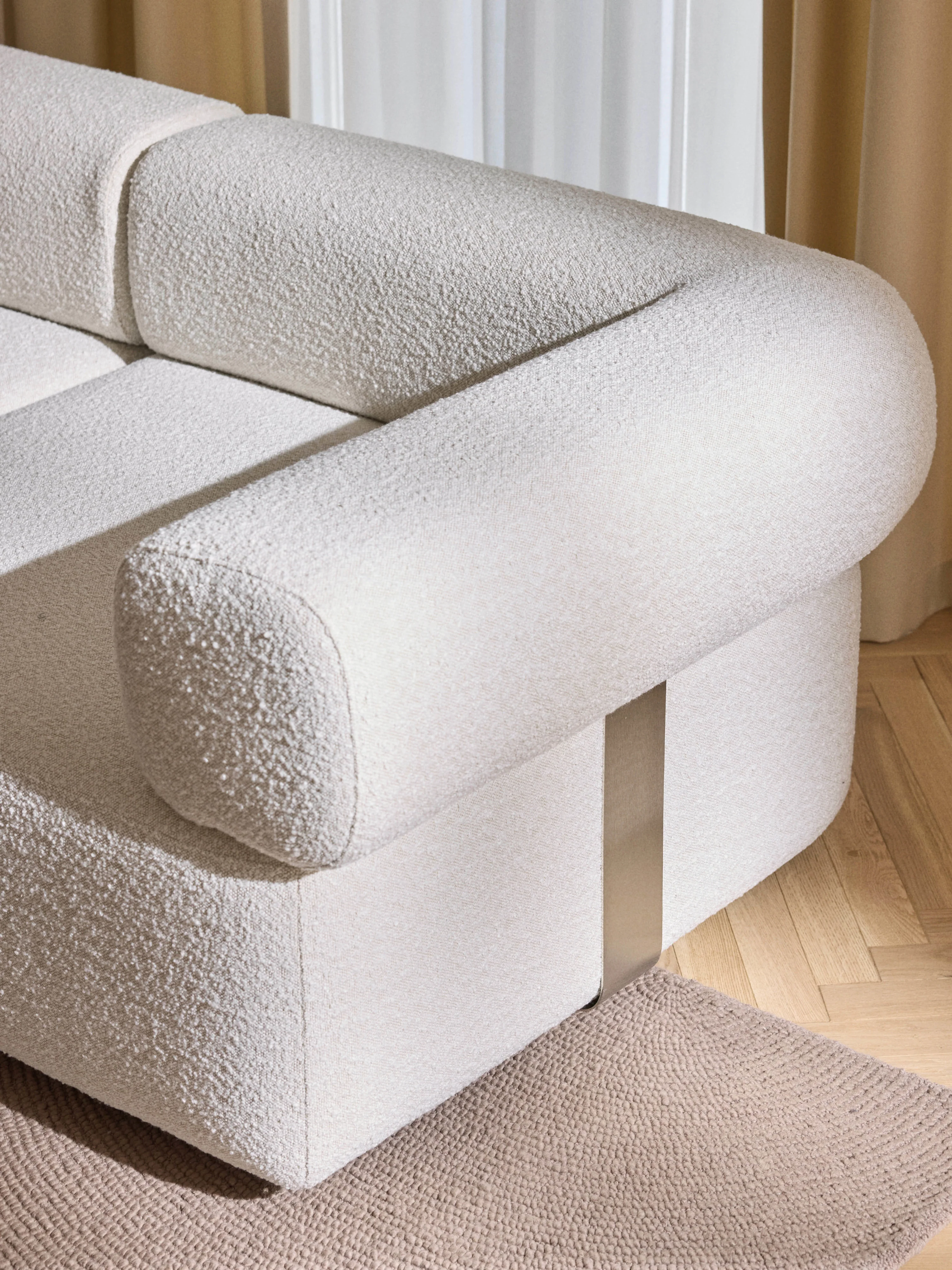 Modulaire bouclé bank Anton (4-zits) met poef (links/rechts)