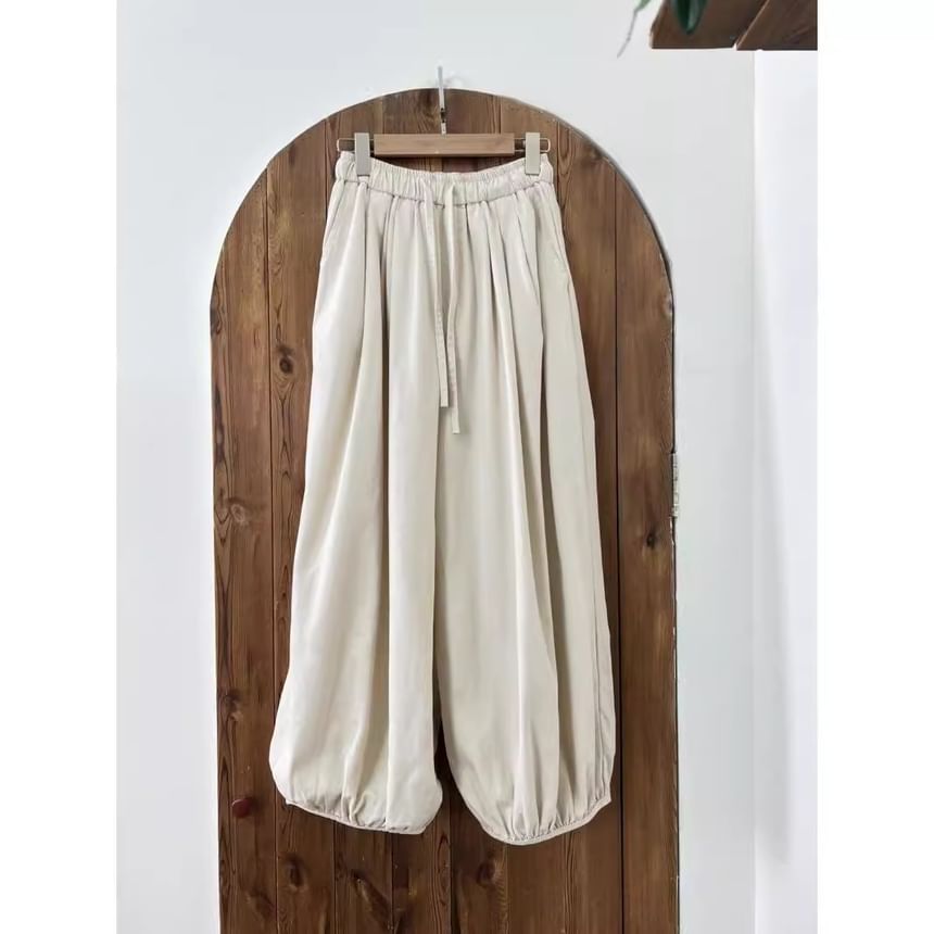 Fluffush - Effen, cropped baggy broek met trekkoord in de taille