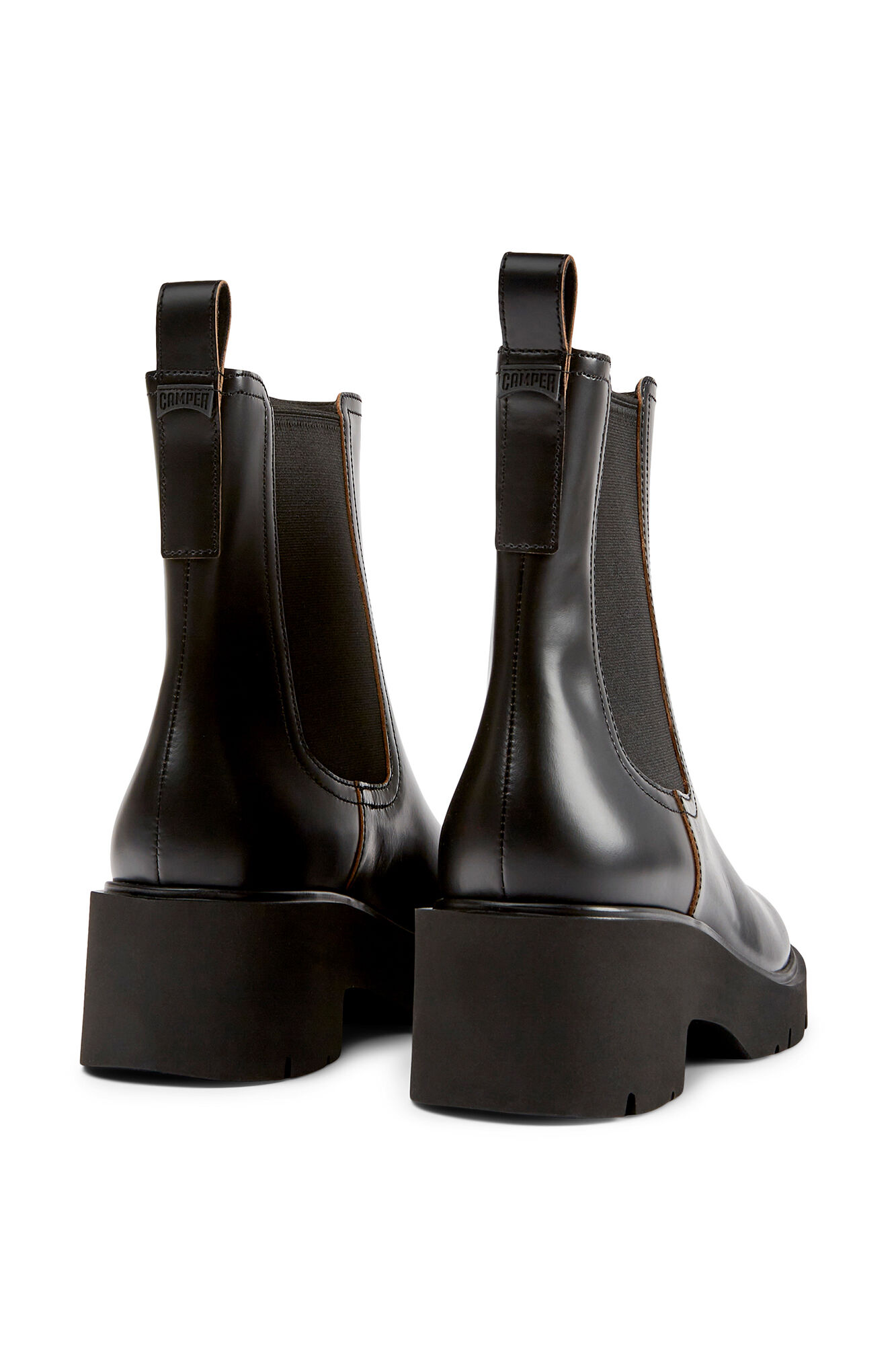 Botas femininas de couro com solado de EVA.
