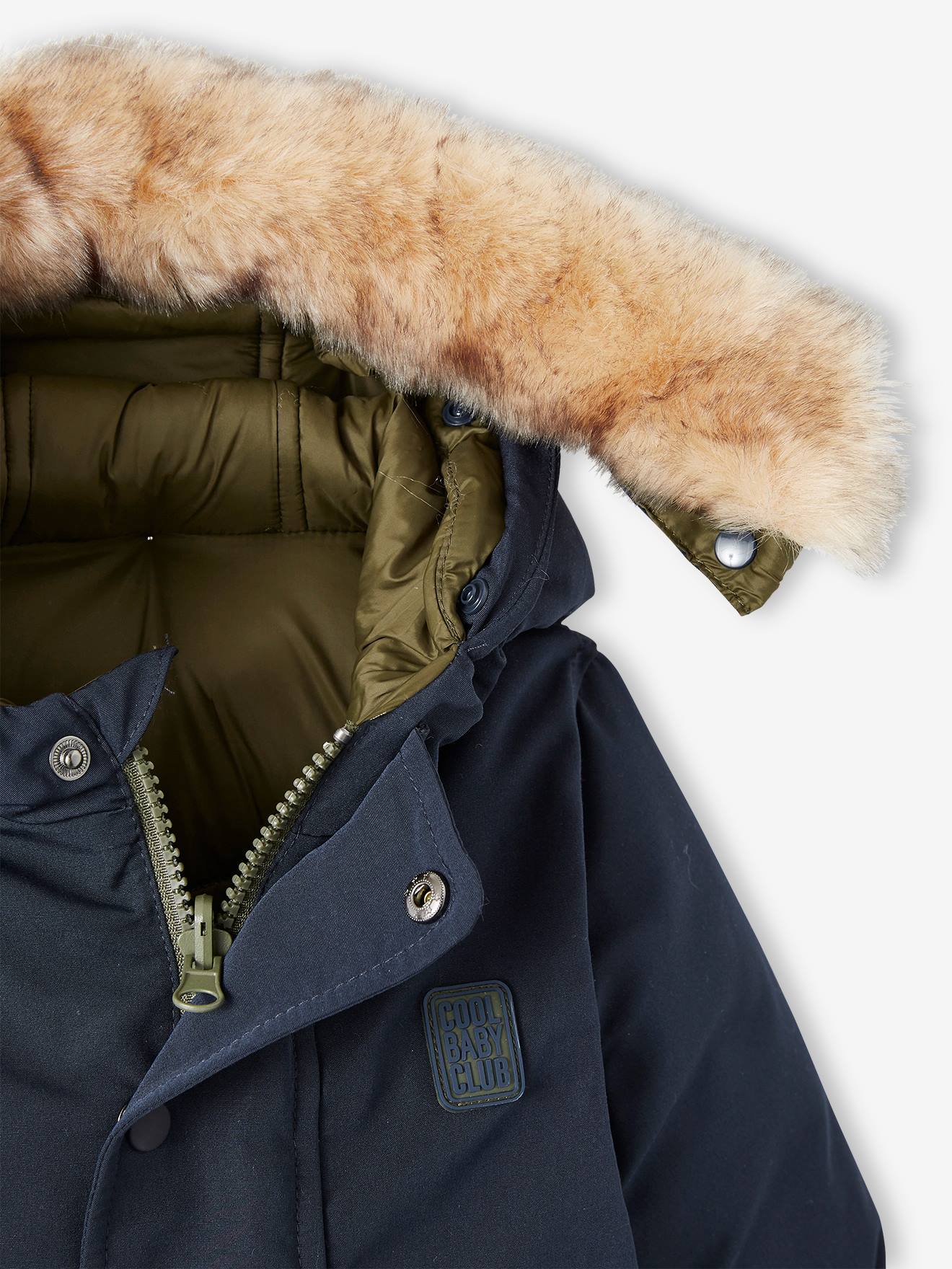 Casaco parka reversível para bebê com capuz, azul escuro liso com estampas.