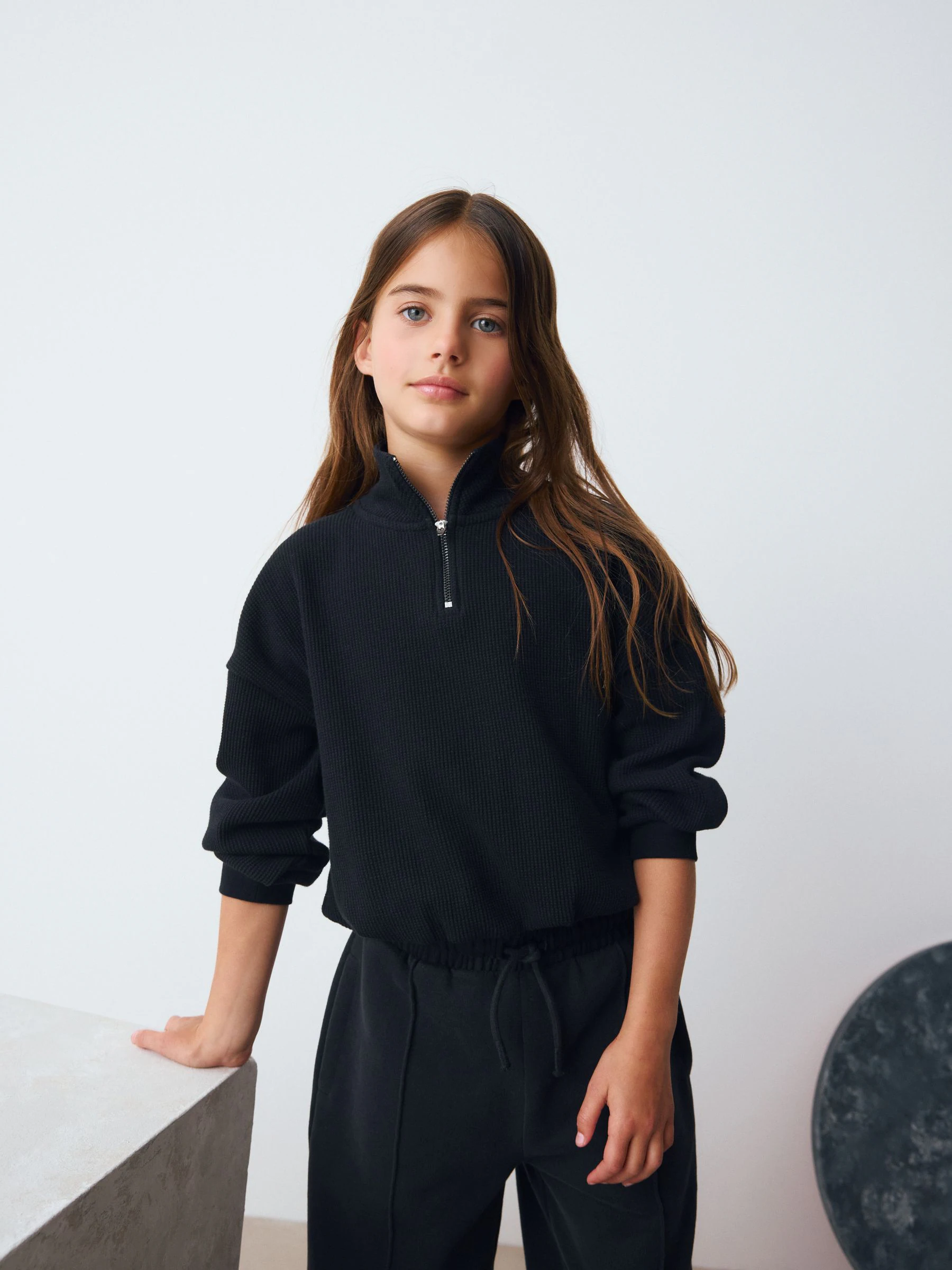 Zwart - Getextureerde sweater met lange mouwen en rits (3-16jr)
