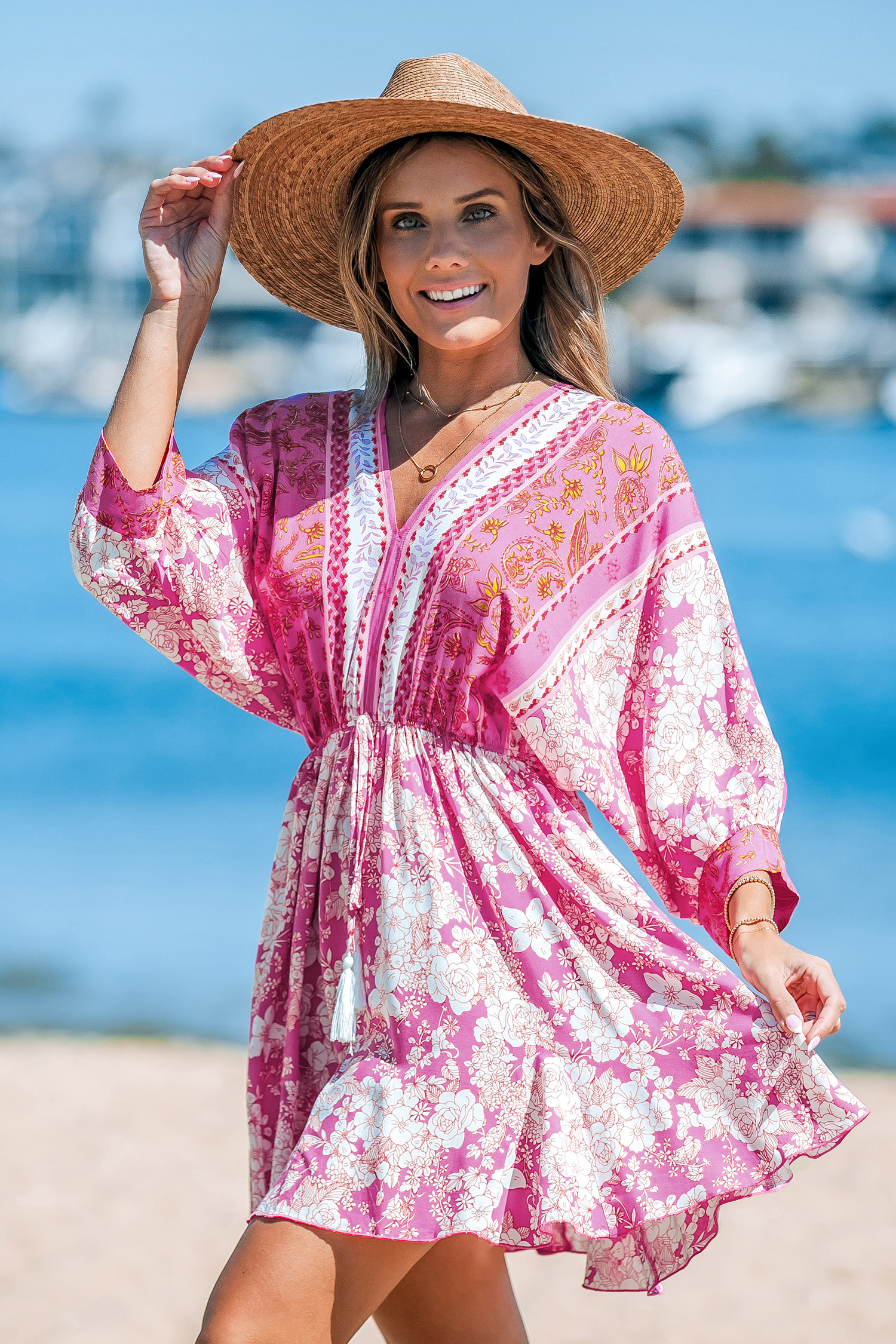 Robe mini à pompons et imprimé floral