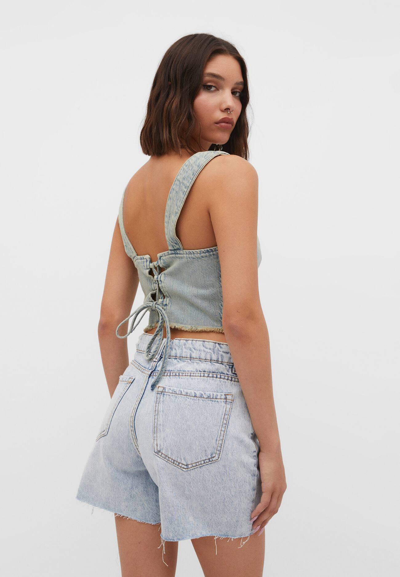 Bermuda jeans rasgada