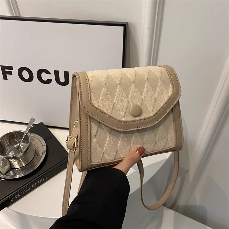 Basaran - Crossbodytas met contrasterende rand en klep