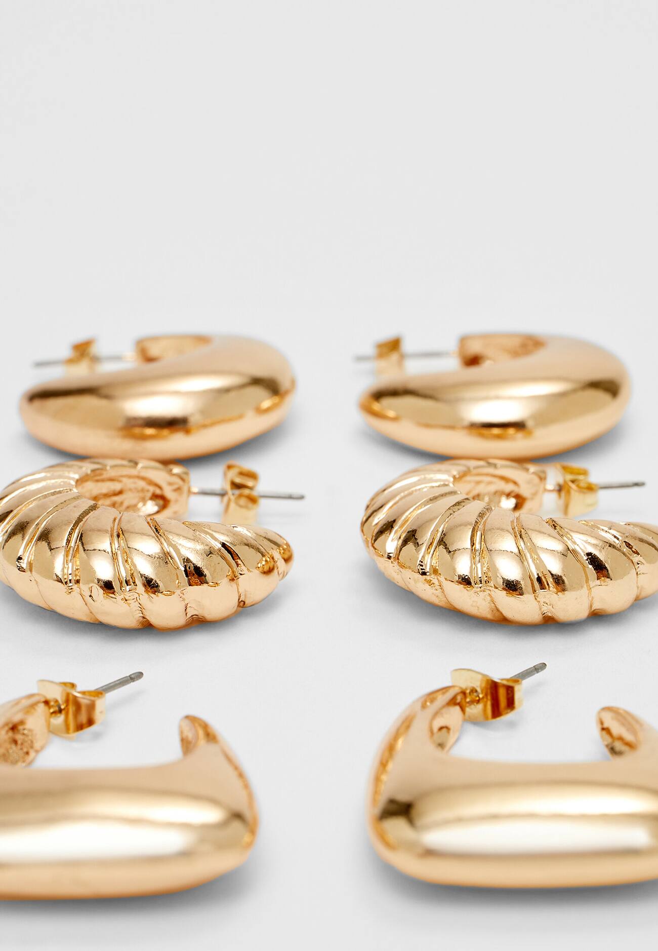 Conjunto de 3 pares de brincos de argola texturizados