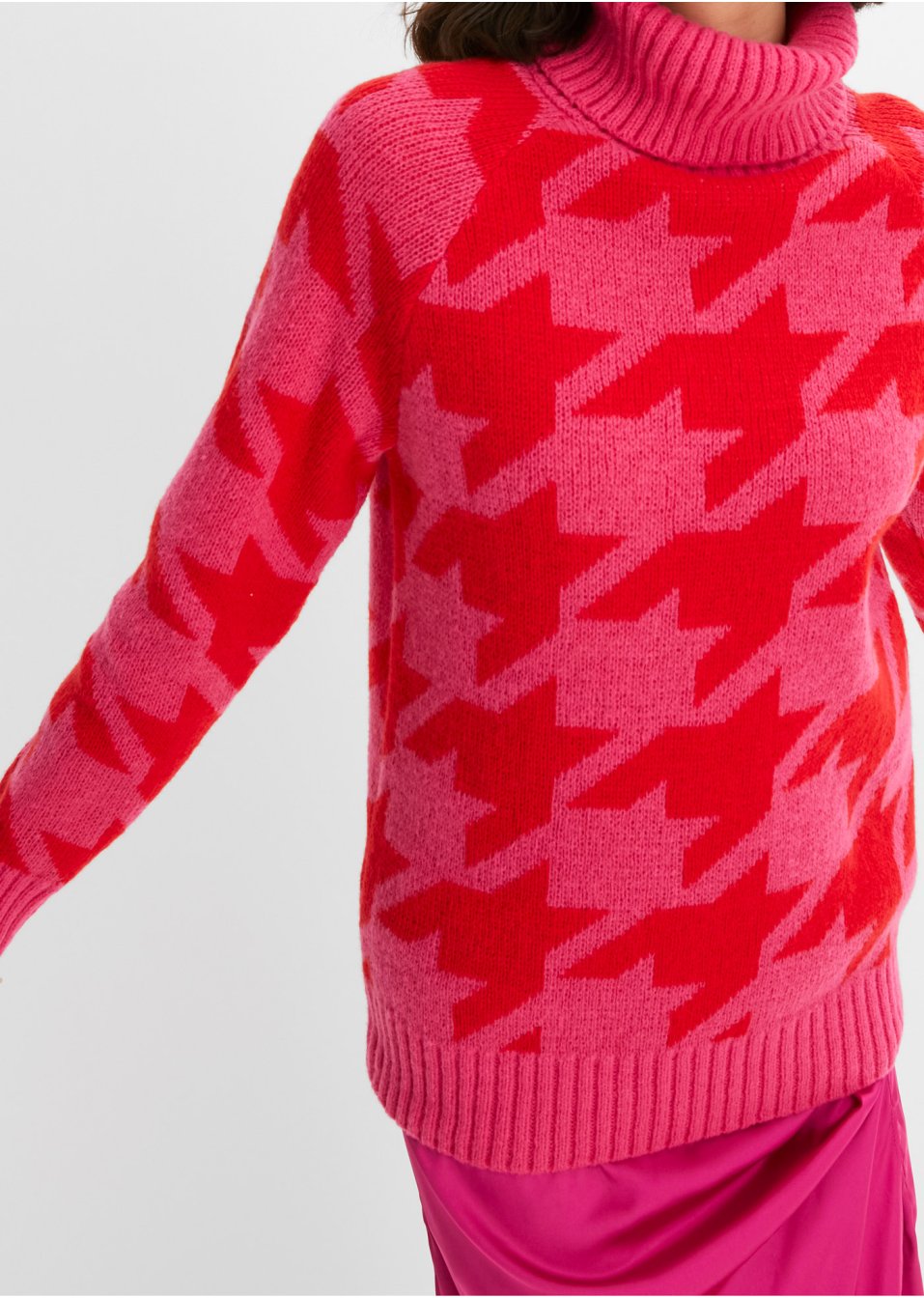 Pull col roulé à motif