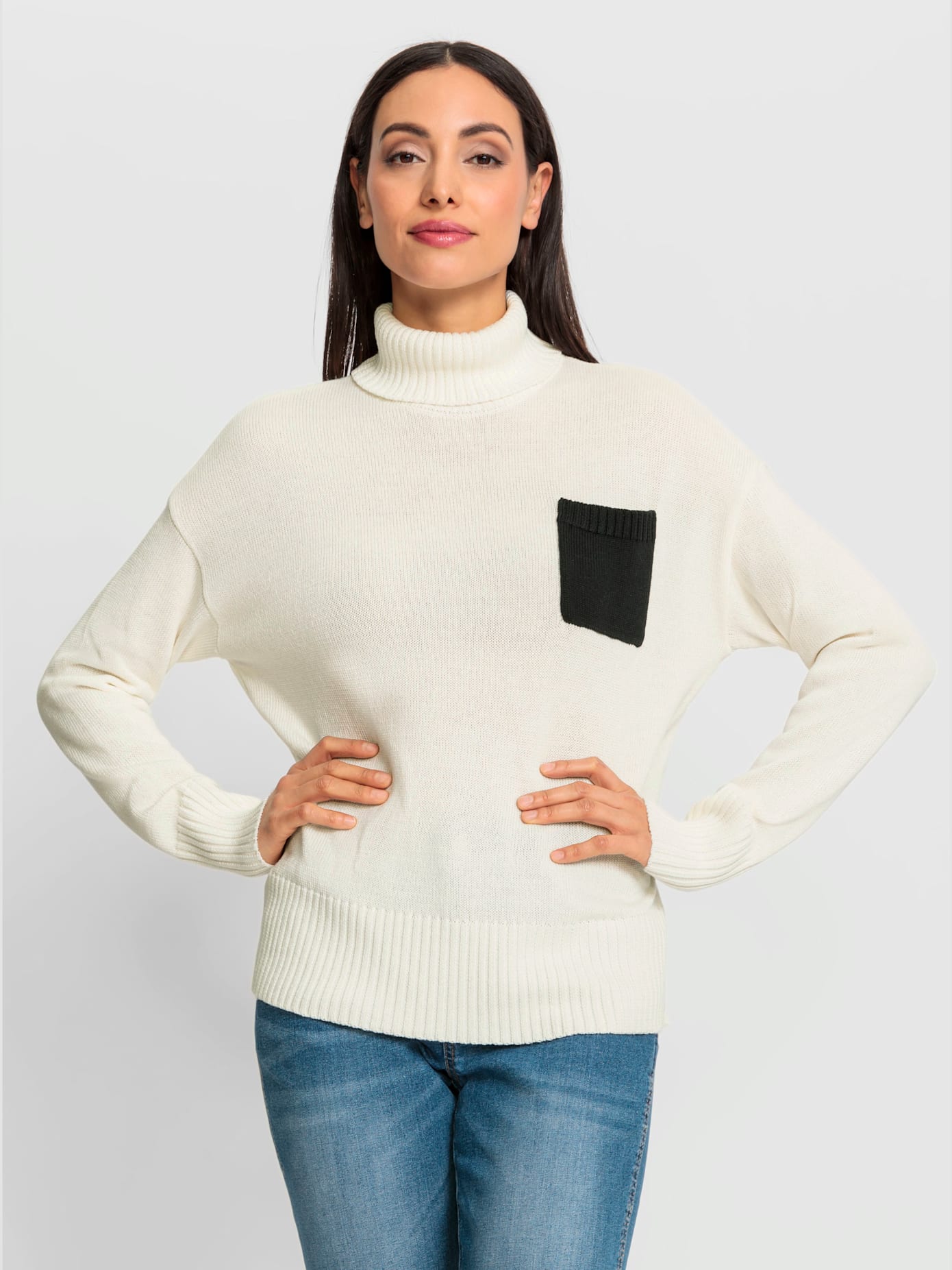 Pull à col roulé détails contrastés
