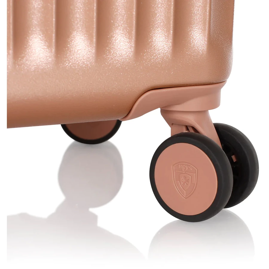 Heys Luxe - 4-Rollen-Trolley L 76 cm erw. rose gold
