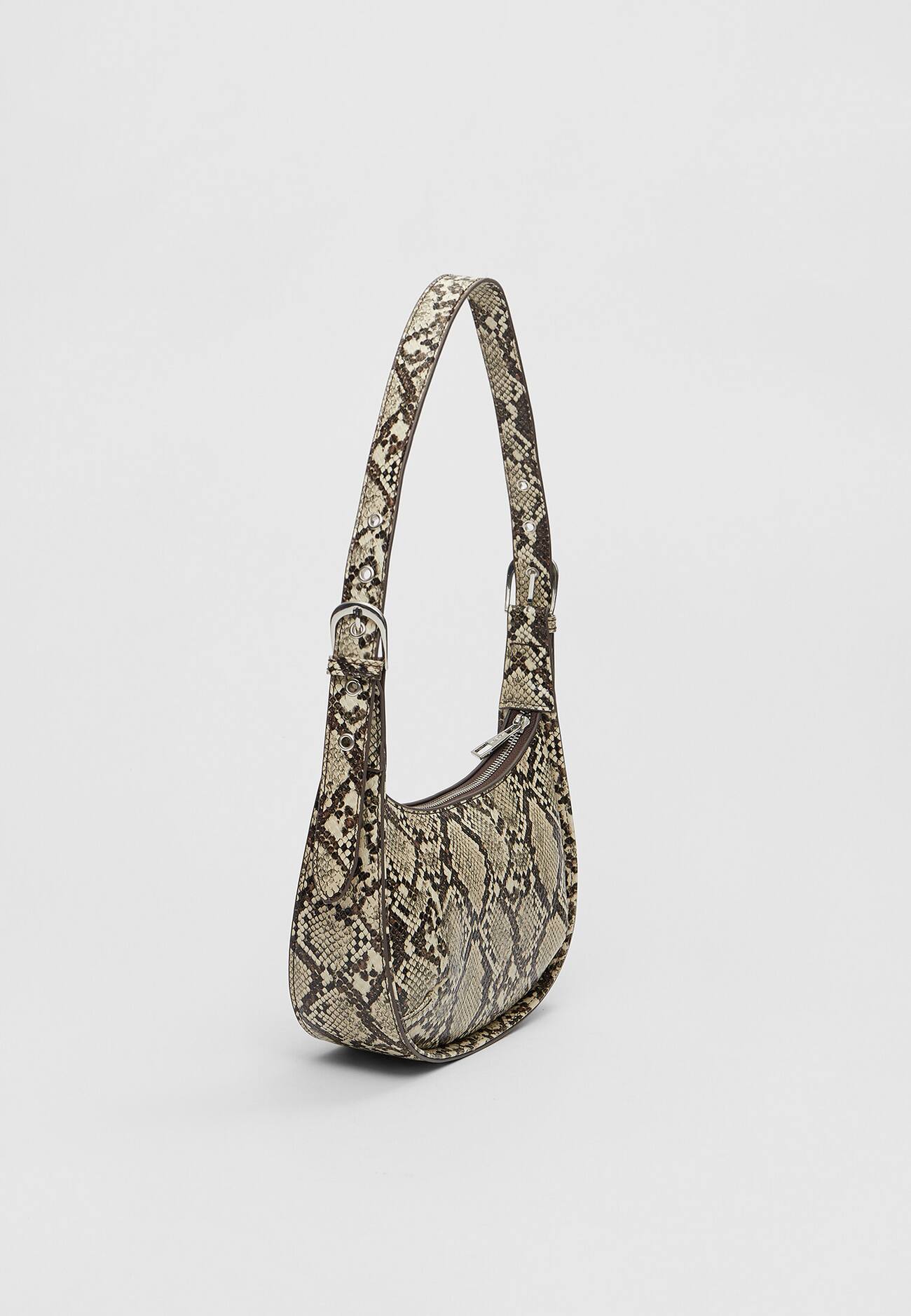 Bolsa de ombro imitando crocodilo