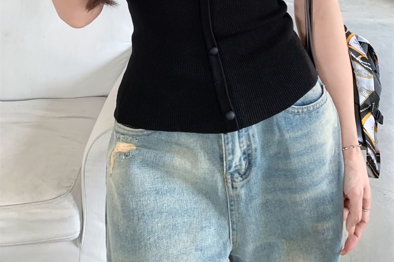Tel tot 10 - Tweekleurige gebreide top met korte mouwen en off-shoulder