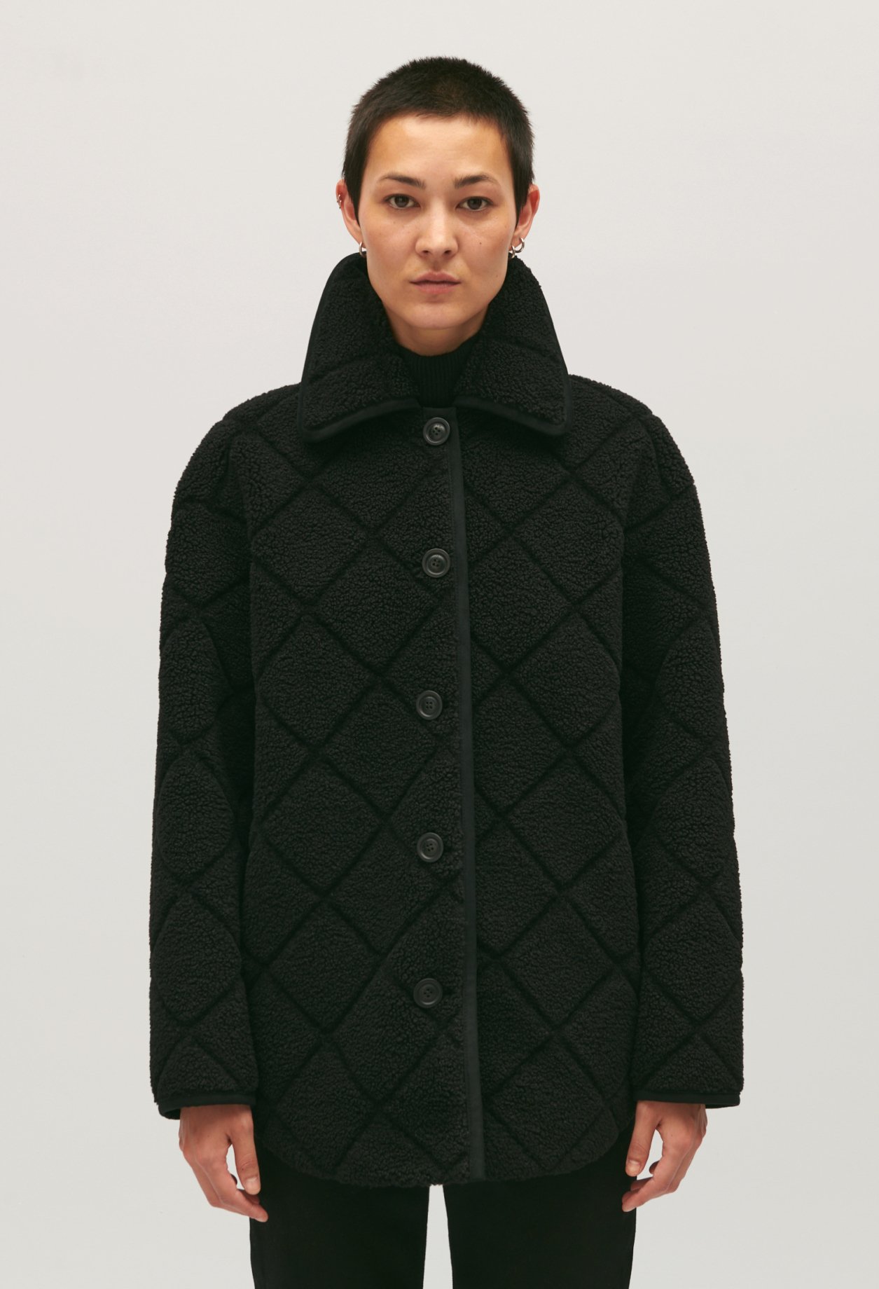 Manteau effet peau lainee