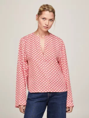 Blusa de modelagem solta com decote em V e estampa geométrica