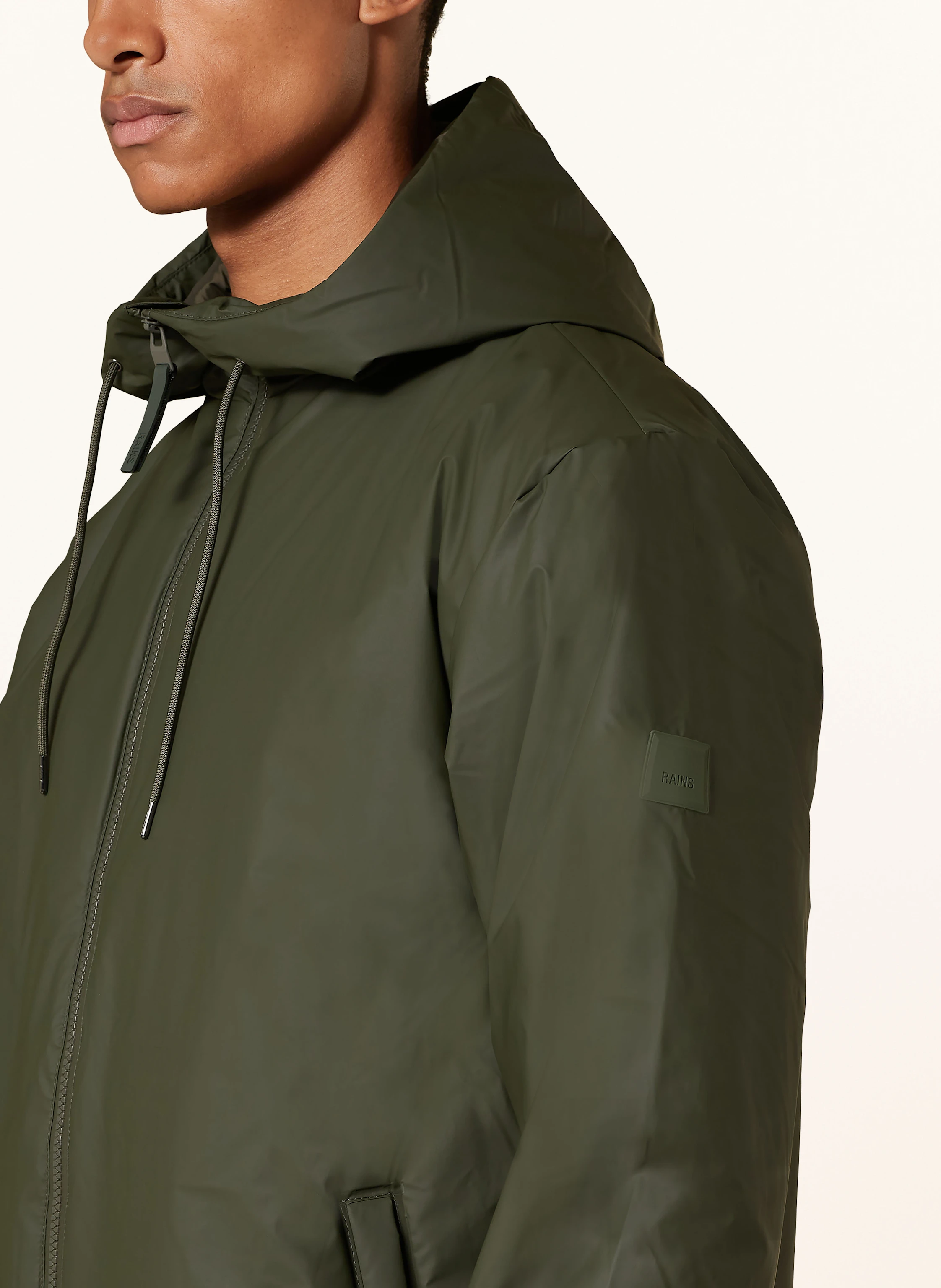 RAINS Regenmantel