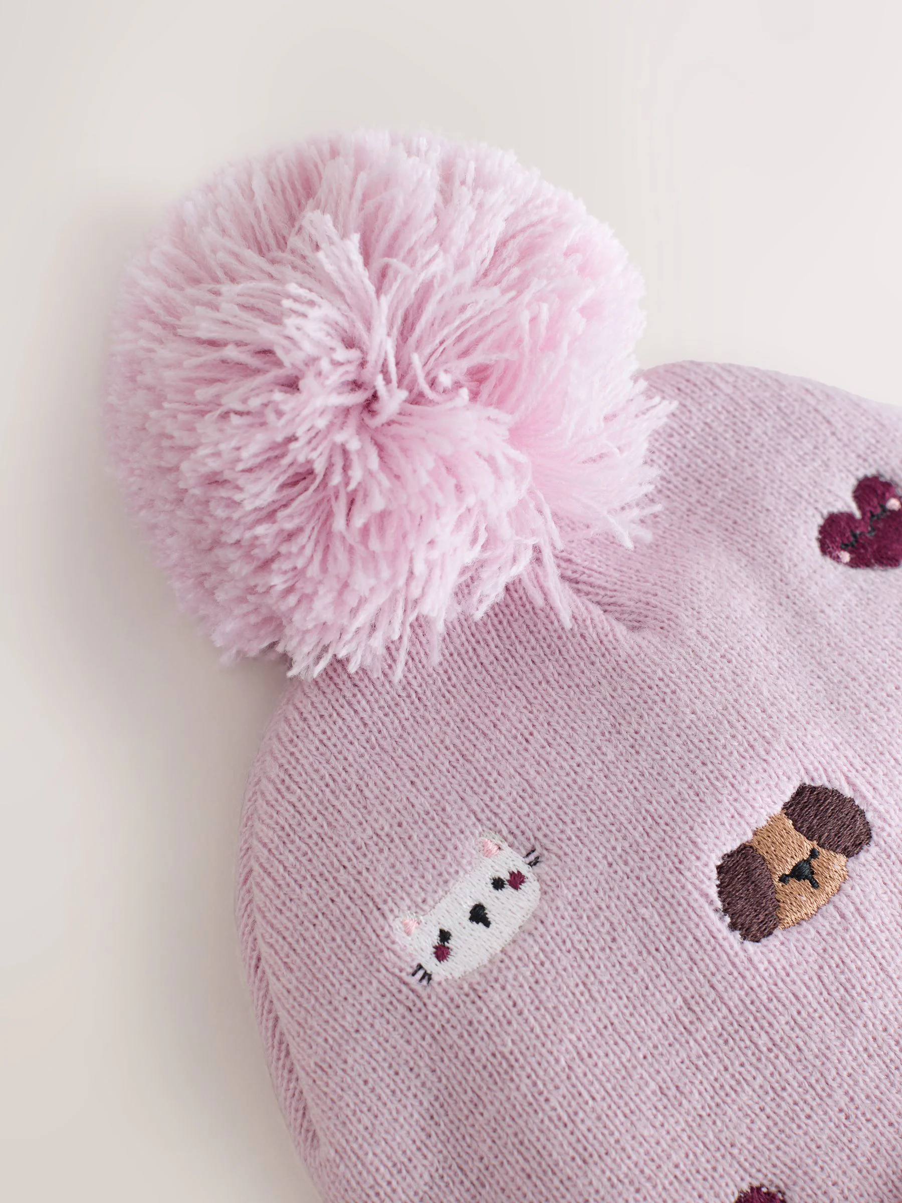 Huisdieren - Geborduurde Beanie-muts met pompon (3mnd-10jr)