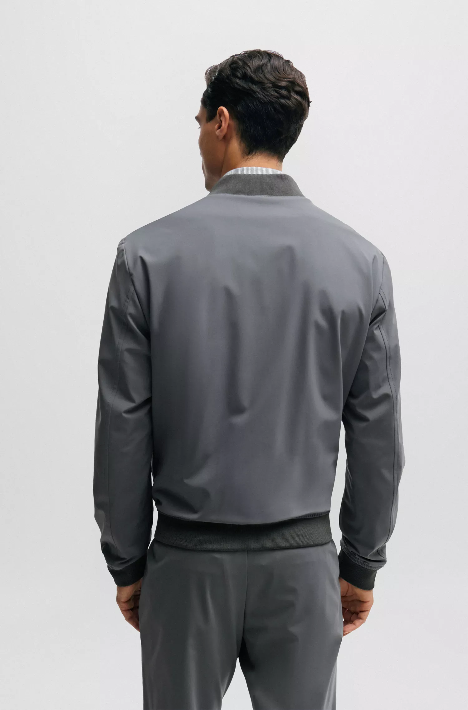 Jaqueta BOSS preta de corte slim em malha resistente a amassados