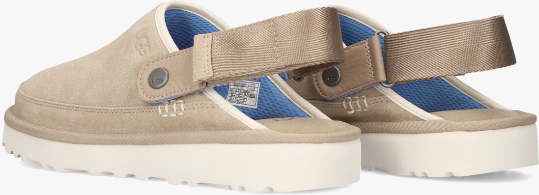 beige ugg slippers marketing model