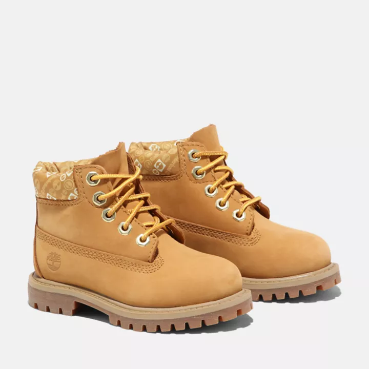 Bota infantil premium impermeável de 15 cm na cor amarela.