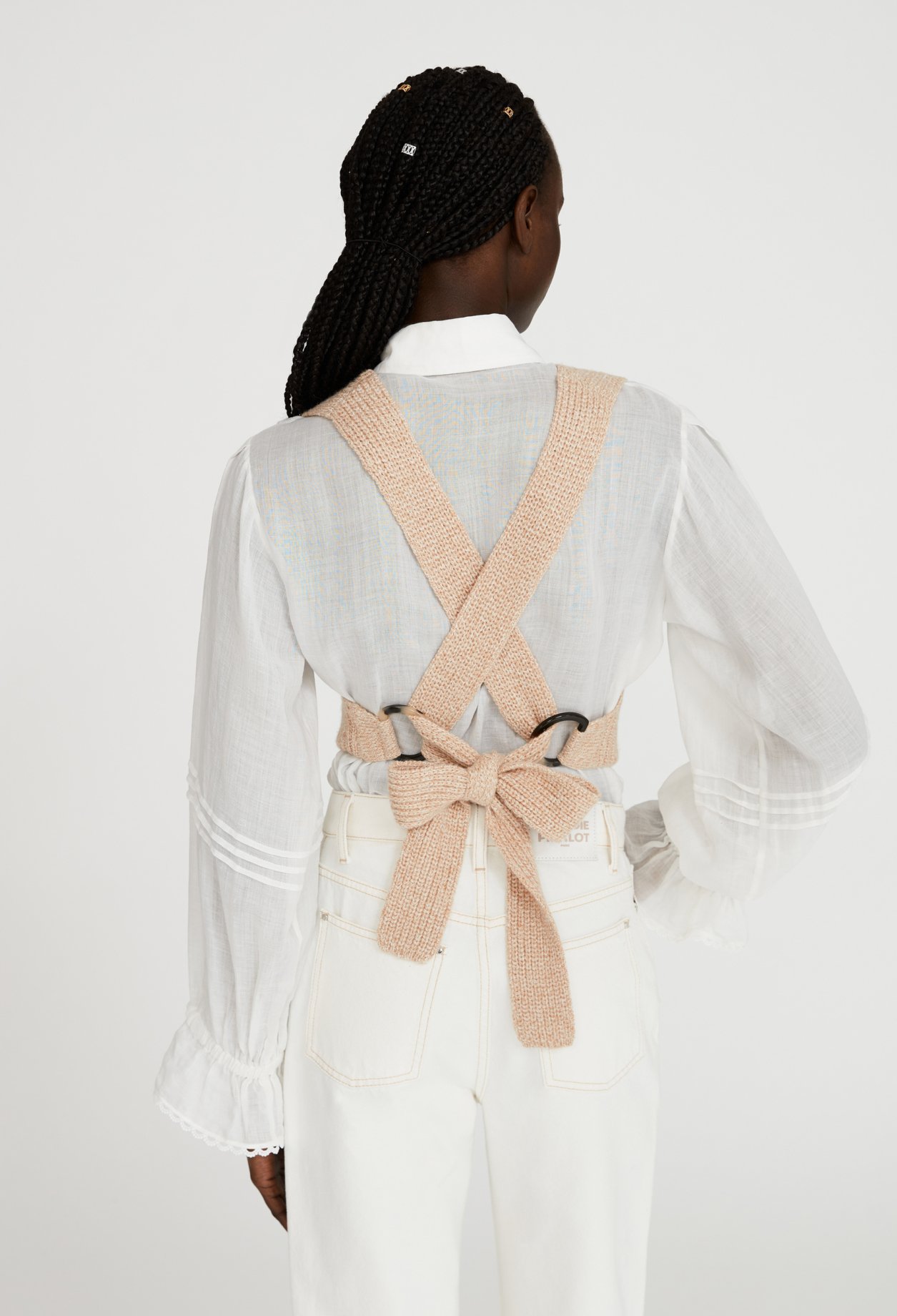Pull sans manche croise dans le dos
