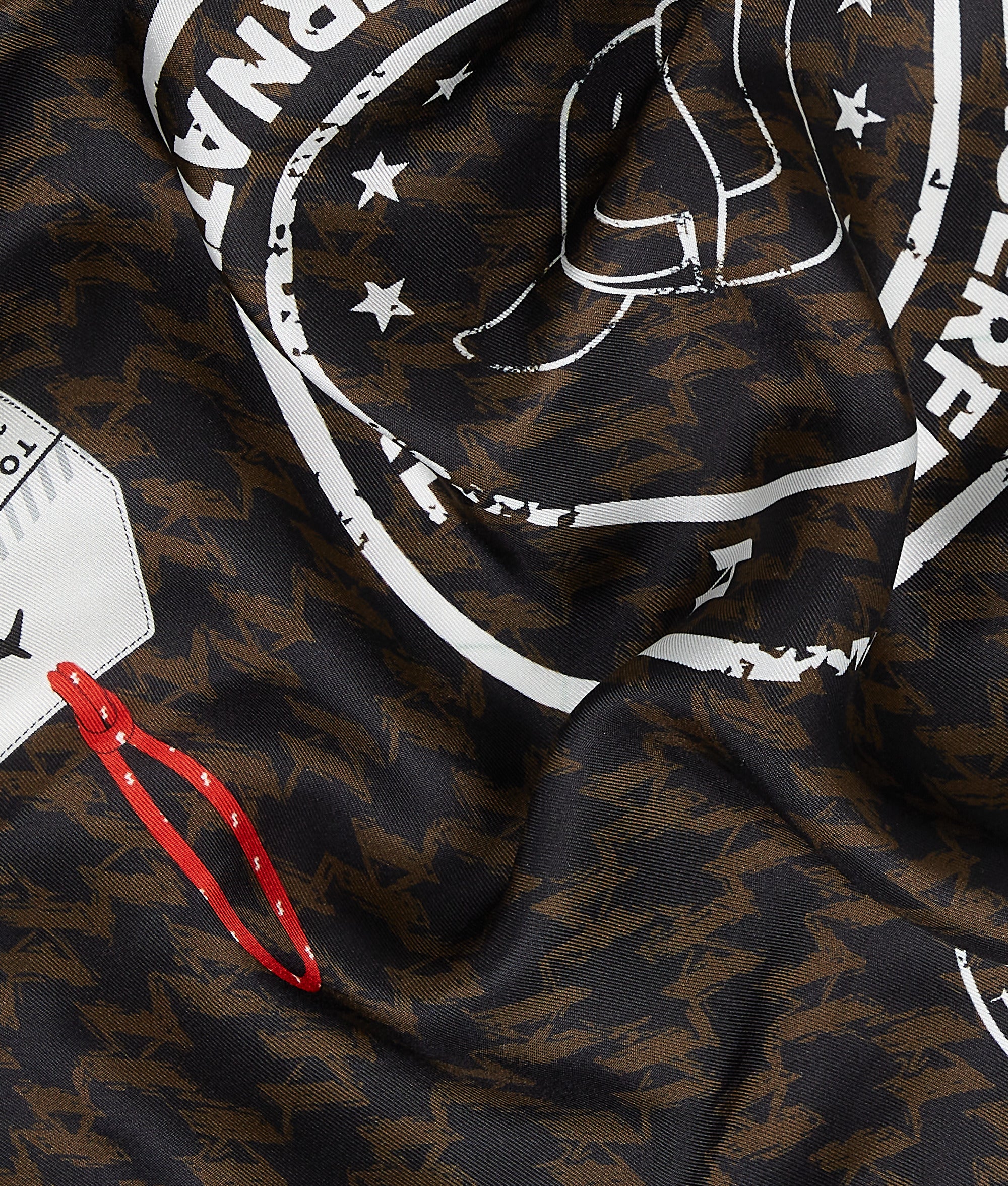 Ikon Monogram sjaal met reisstempels