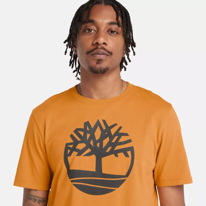 Camiseta masculina amarela com o logotipo da árvore do rio Kennebec.