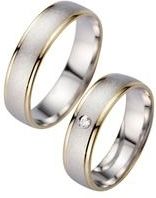 Trouwringen geel en witgoud met Diamant breedte 5,5 mm