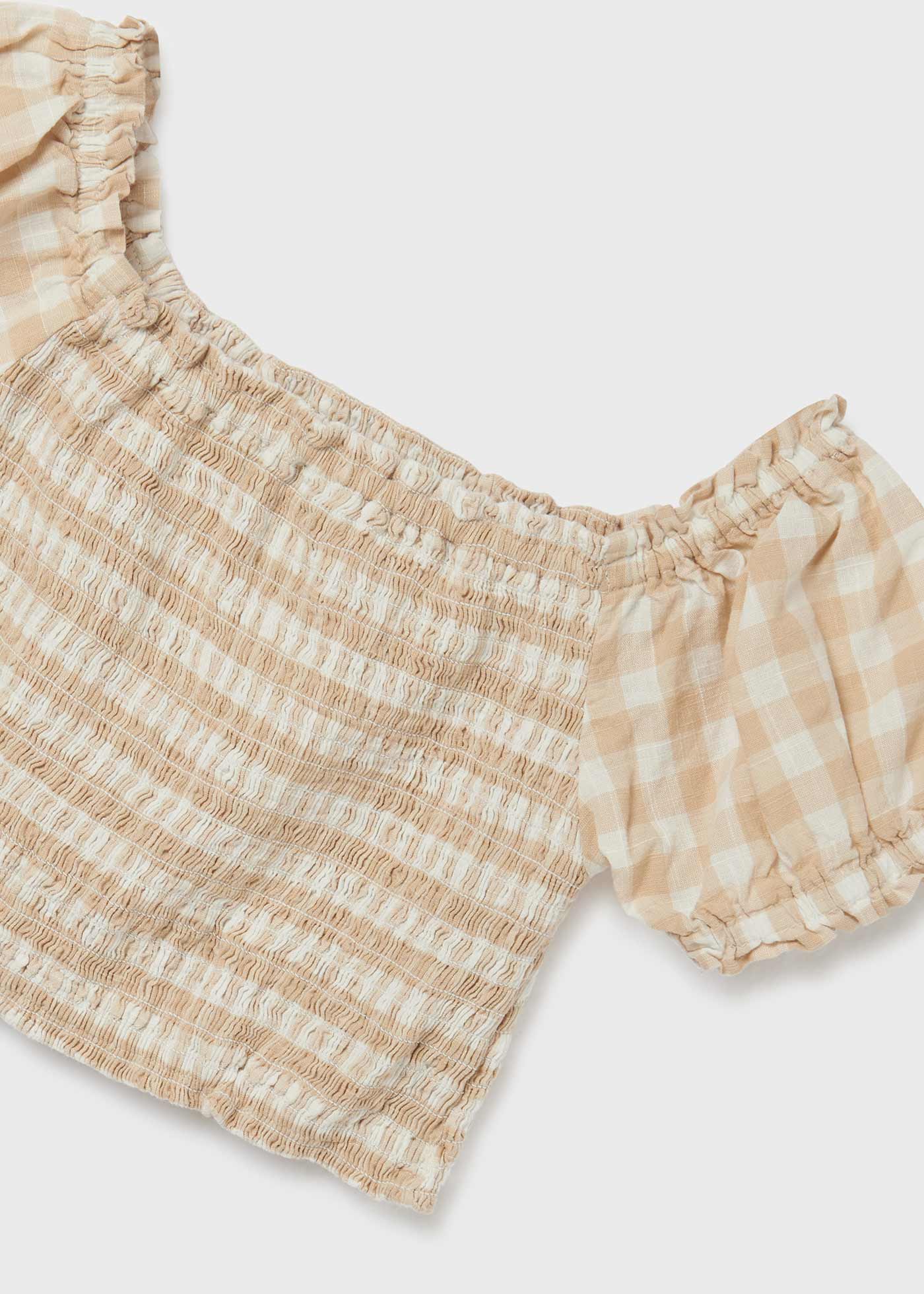 Blusa infantil de algodão com estampa xadrez vichy e detalhes franzidos