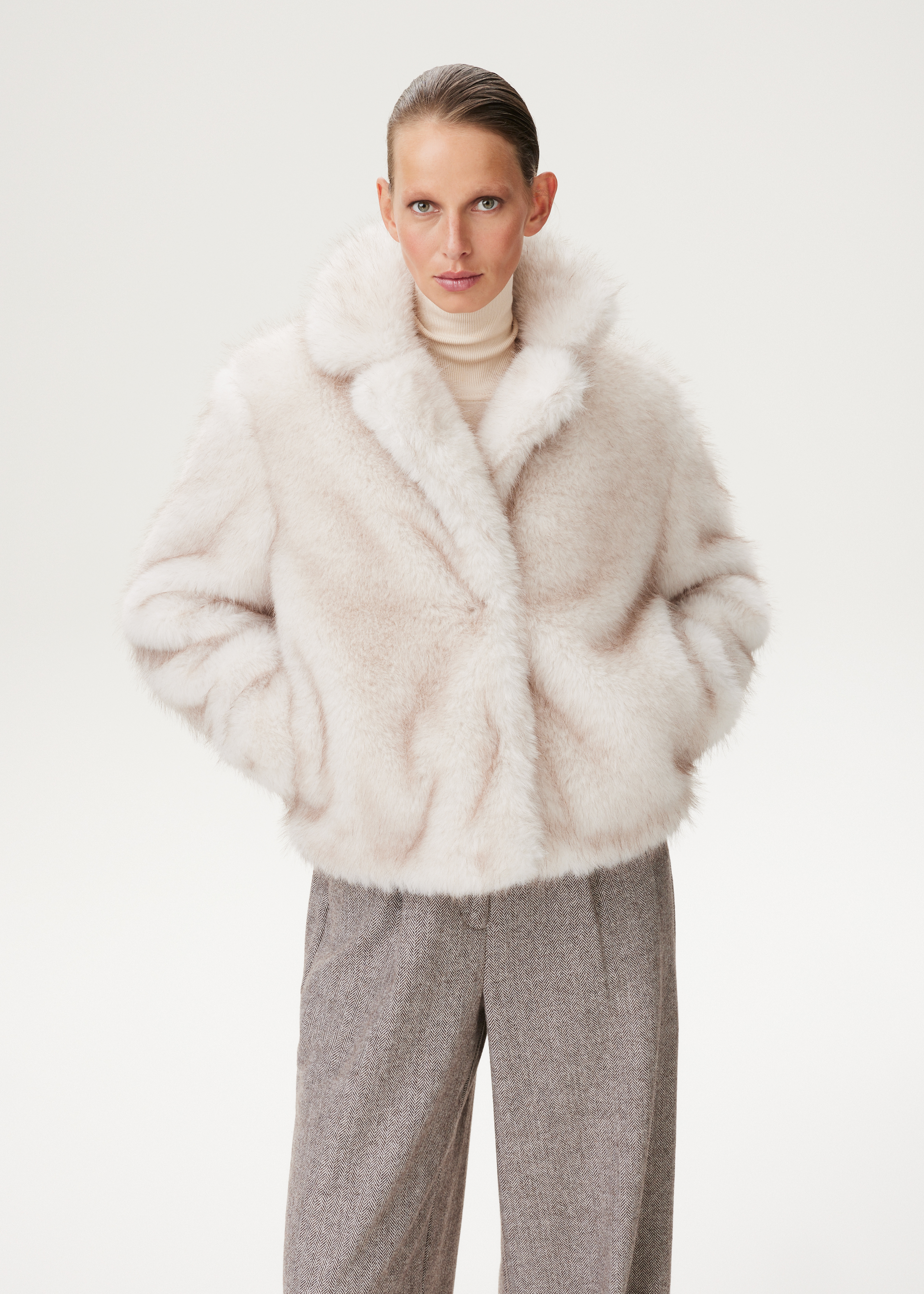 Korte faux fur jas